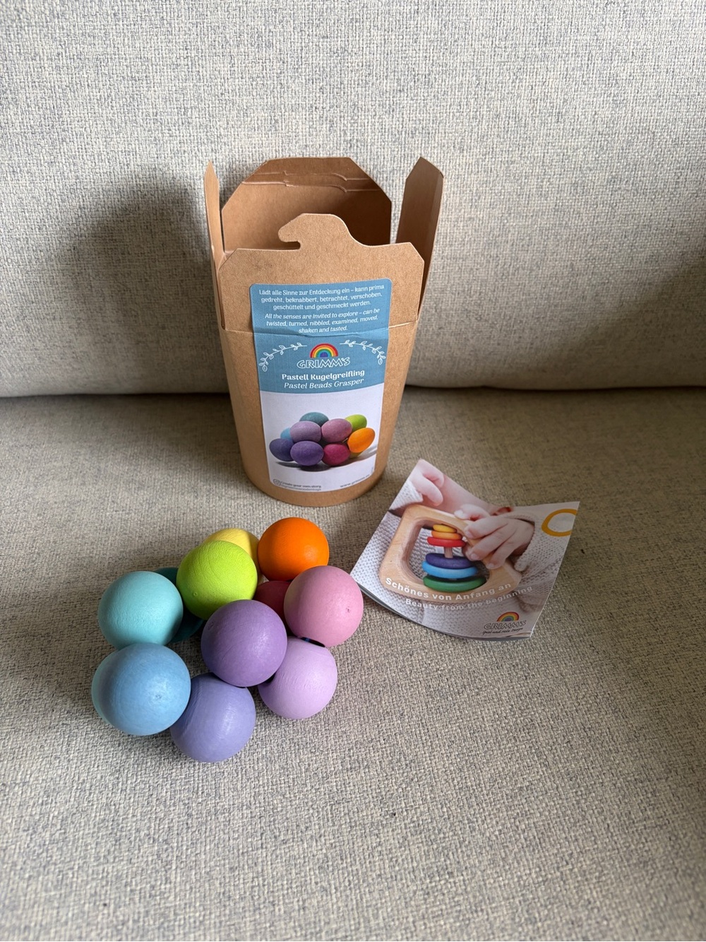 Grimm’s pastel grasper baby toy